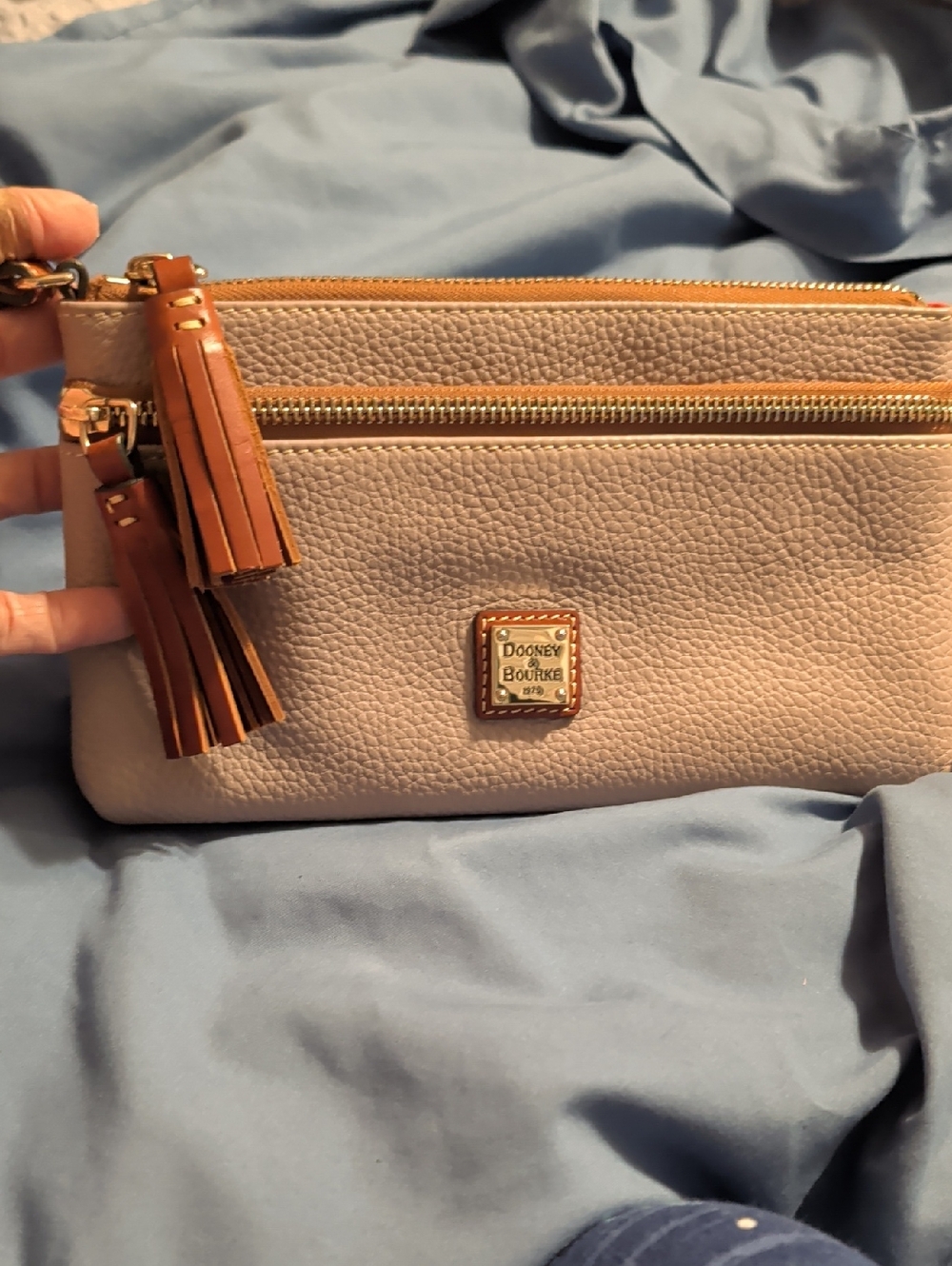 Dooney & Bourke Light Grey Pebbled Leather Wristlet with Tan Tassels